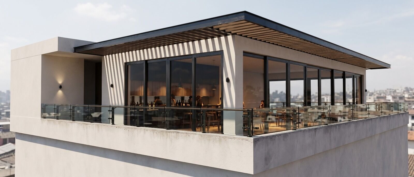 Rooftop de oficinas con estructura de pérgola metálica y ventanales oscuros